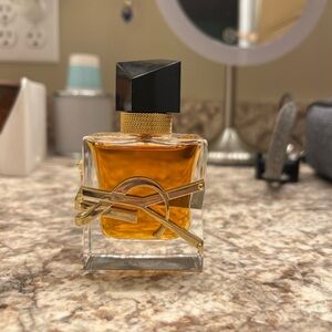 Yves Saint Laurent Fragrance with Black Cap and Gold Accents